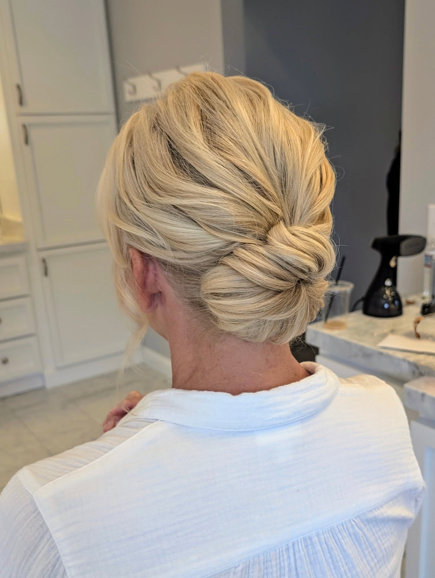 Classic Diagonal French Braid into Low Chignon