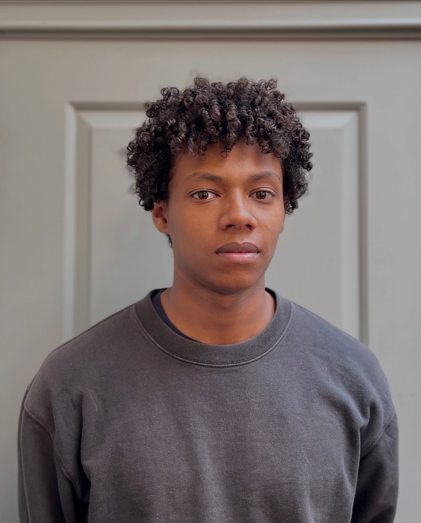 Dynamic Textured Curly Quiff for Men