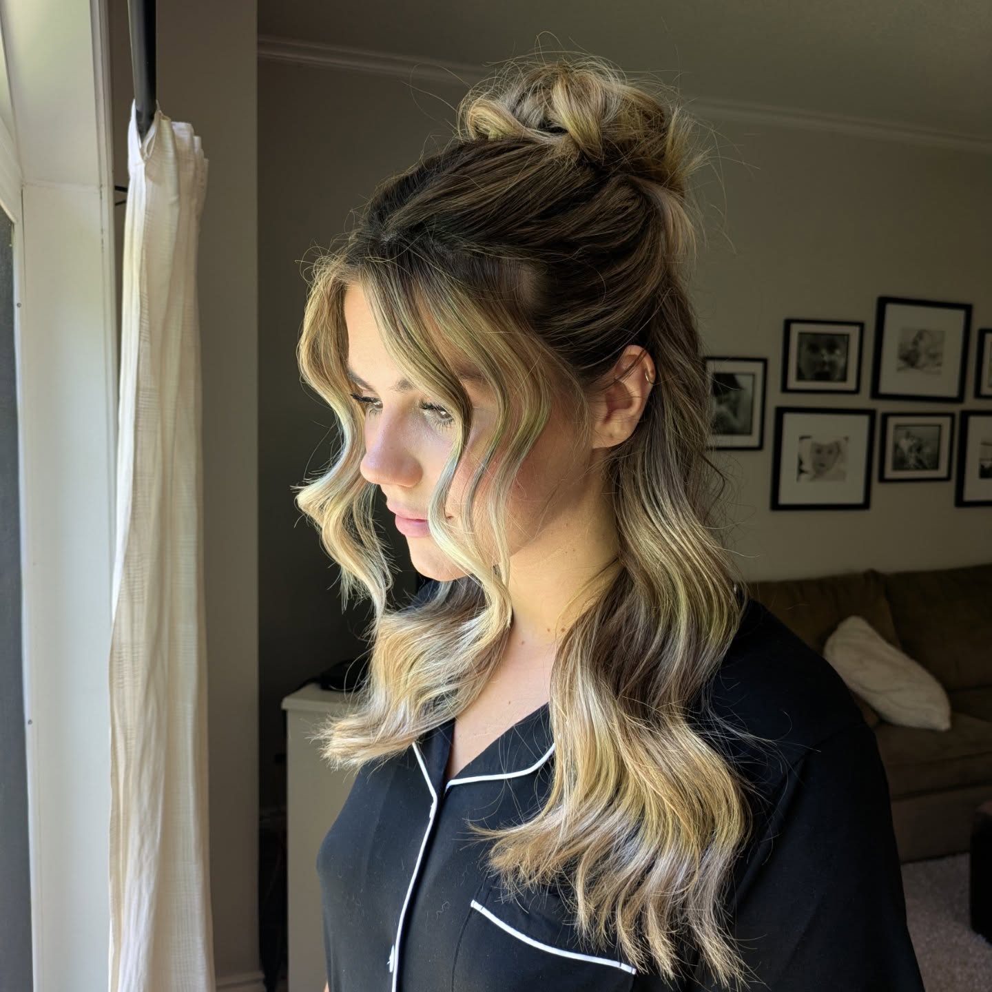 Playful High Bun with Cascading Soft Waves