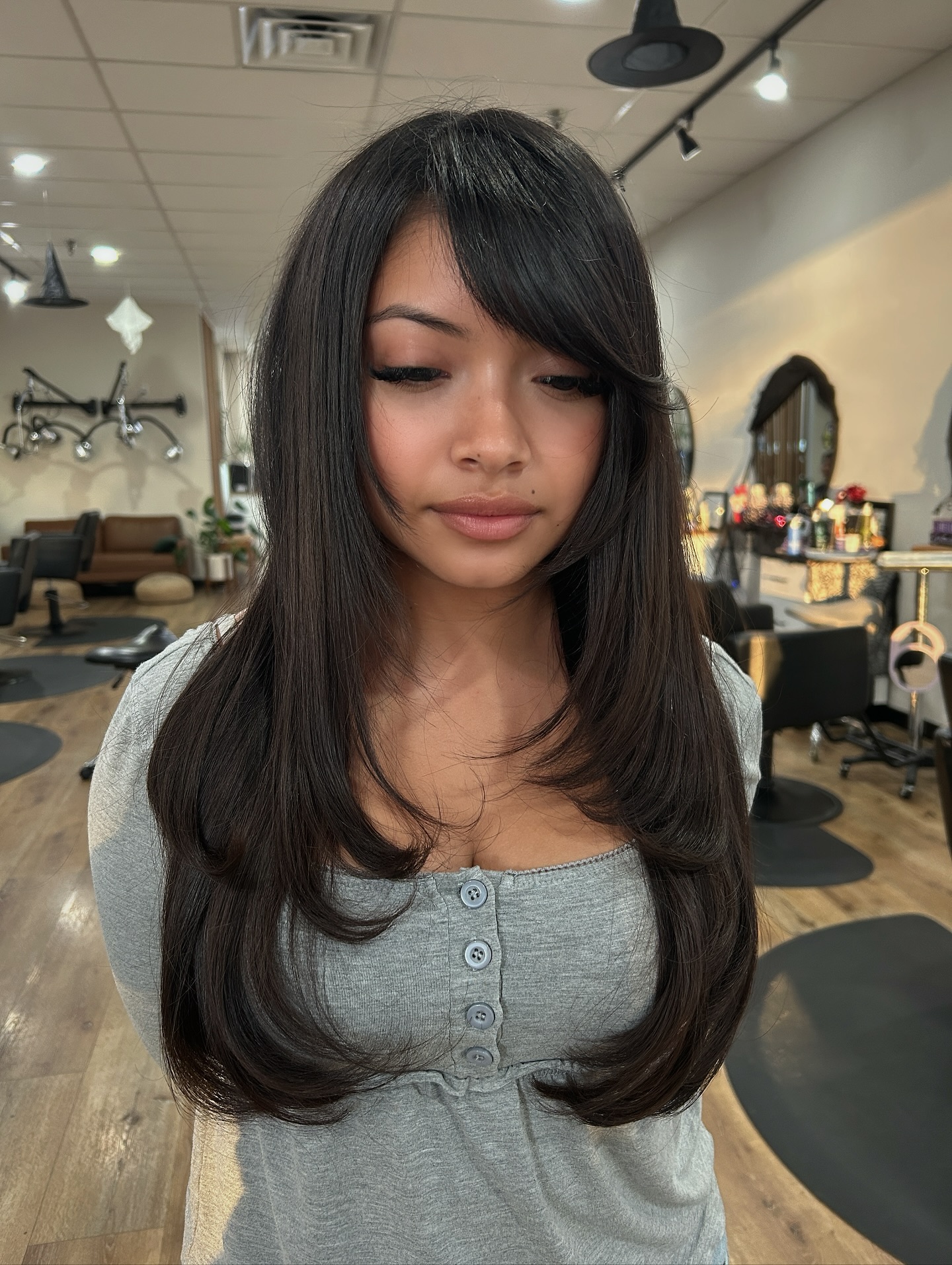 Rich Chestnut Side-Swept Layers with Fringe