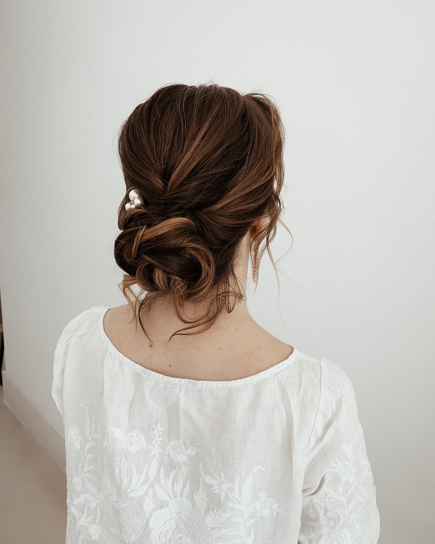 Romantic Textured Low Bun with Pearl Accents