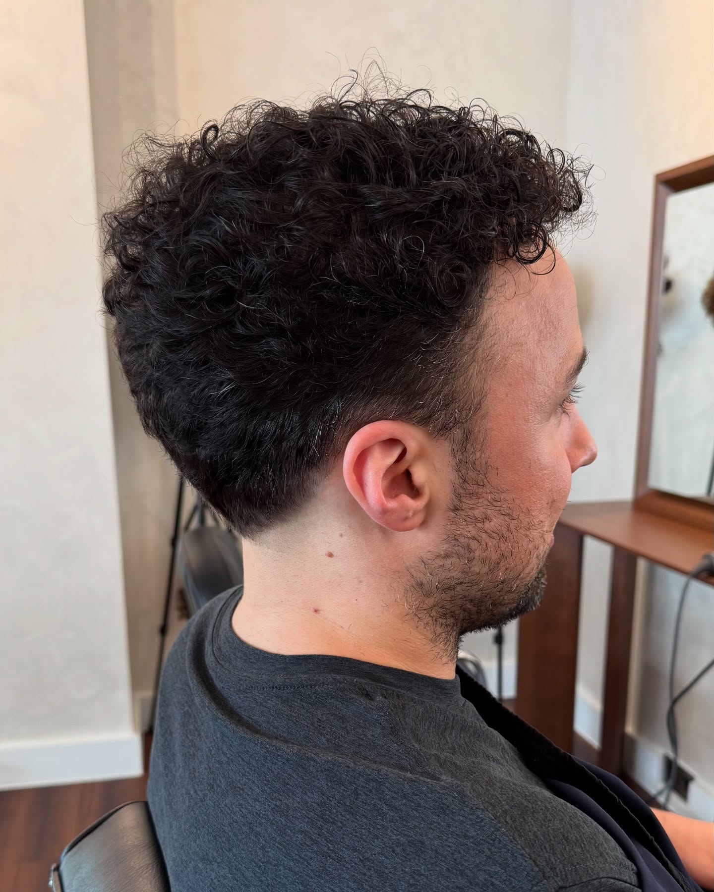 Sharp Tapered Fade with Defined Curly Top