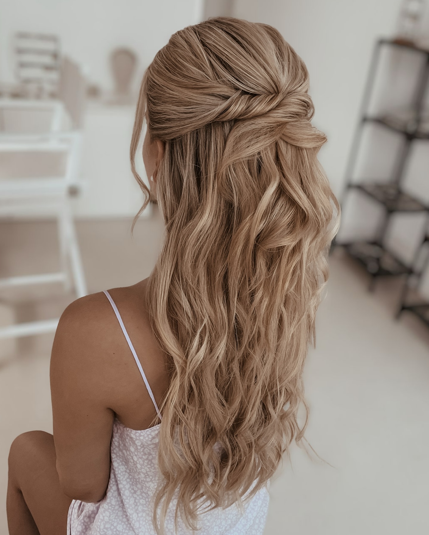 Soft Blonde Flowing Waves with Criss-Cross Half-Upstyle