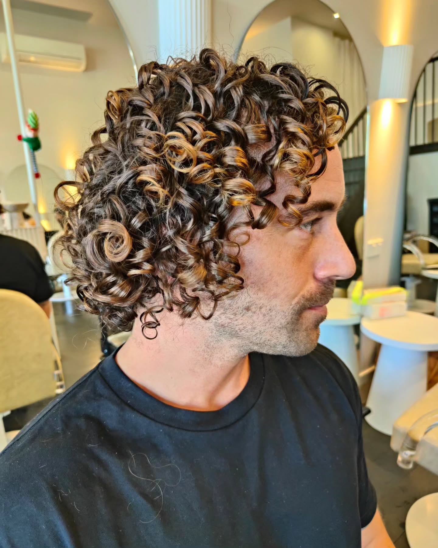 Vibrant Multi-Tonal Curly Crop for Men