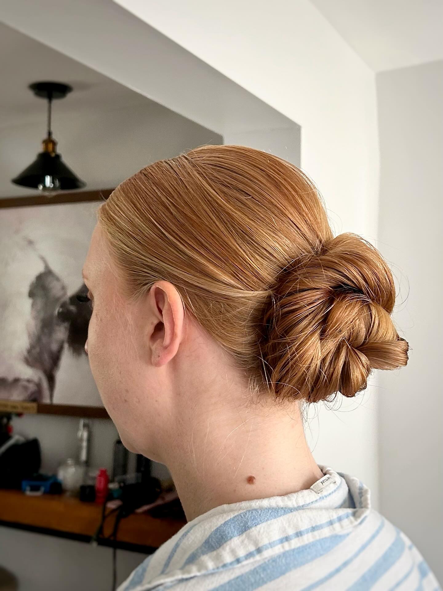 Elegant Twisted Low Bun for Fine Hair
