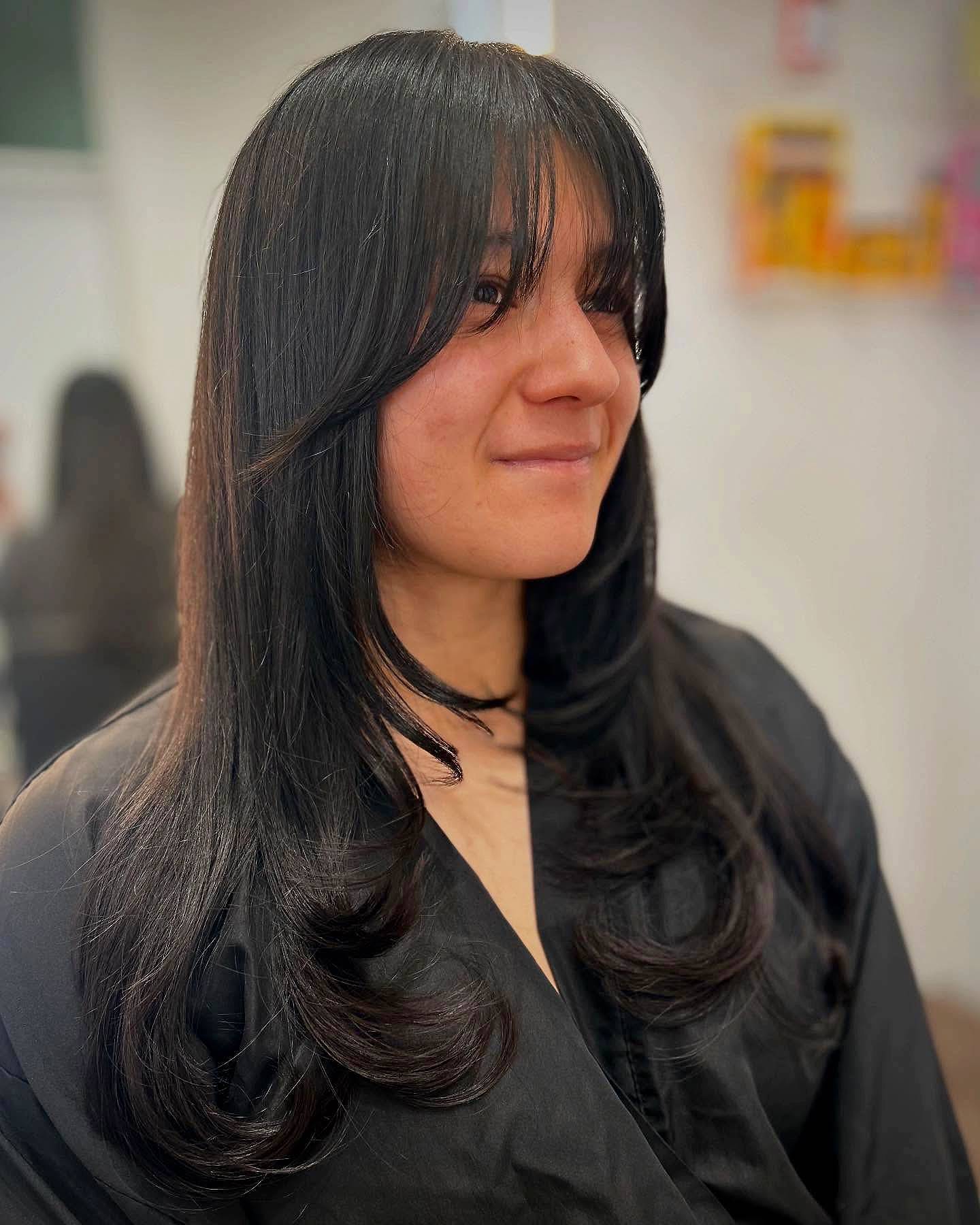 Elegant Wispy Bangs with Subtle Layered Movement