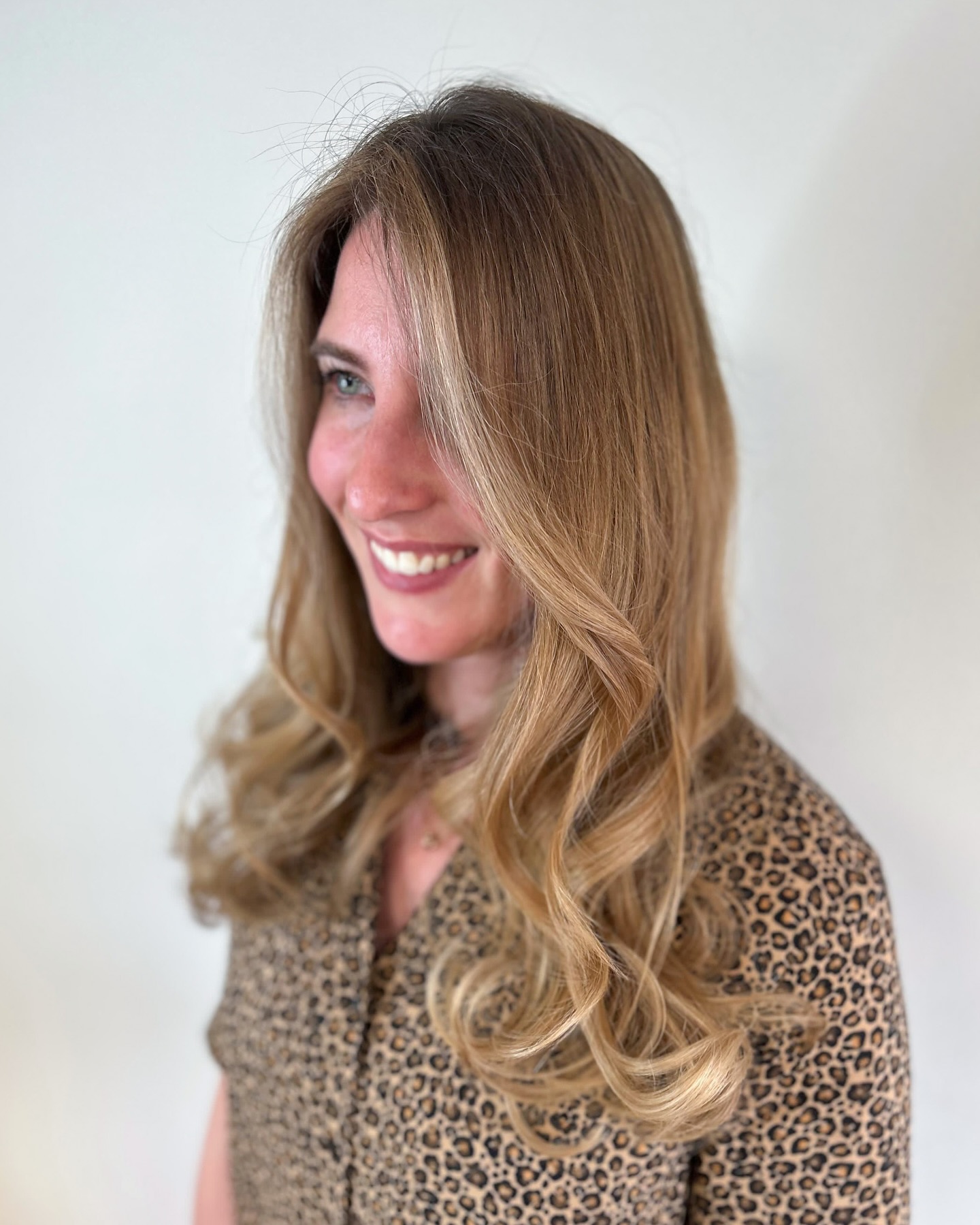 Golden Blonde Soft Waves with Layered Ends