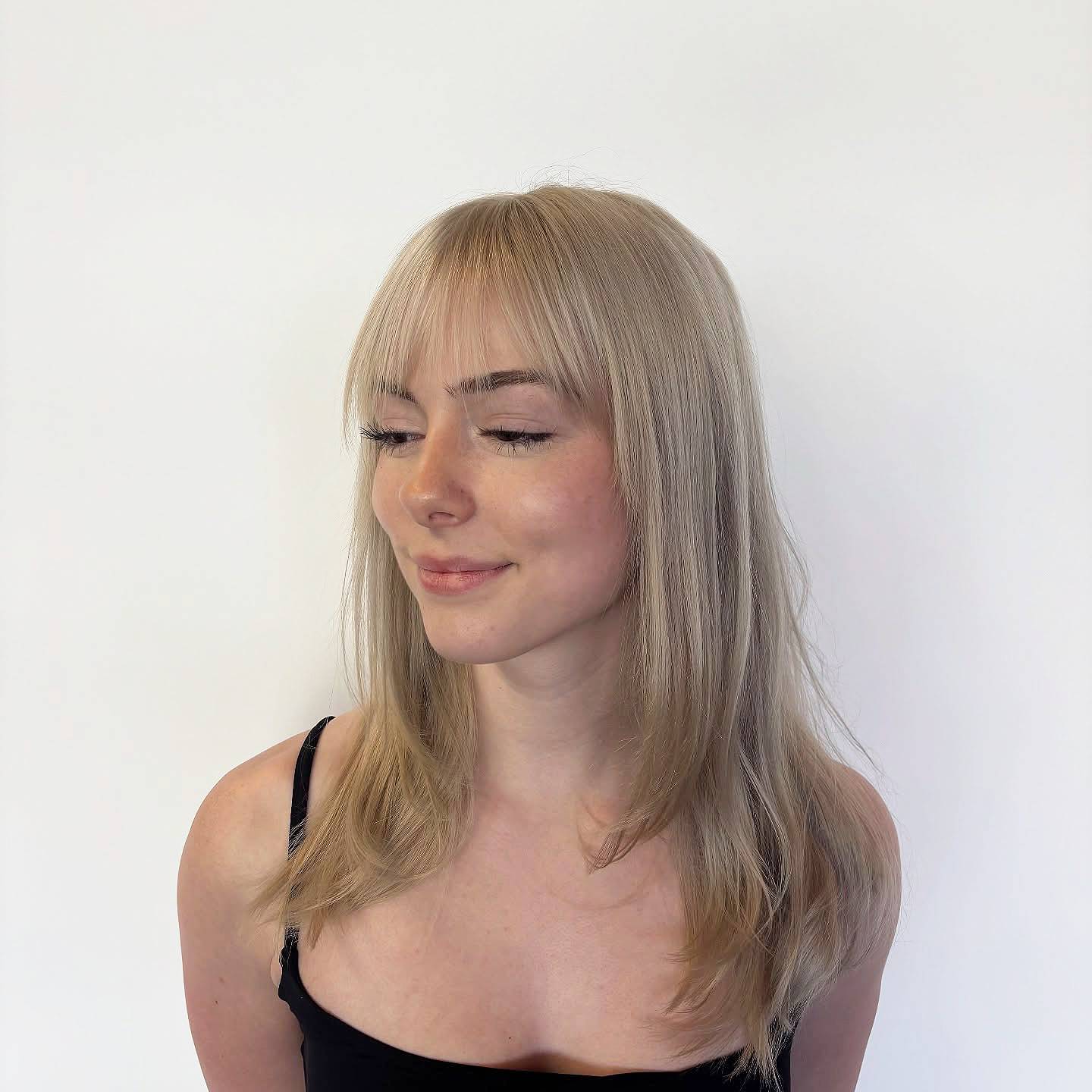 Soft Wispy Bangs with Long, Layered Length