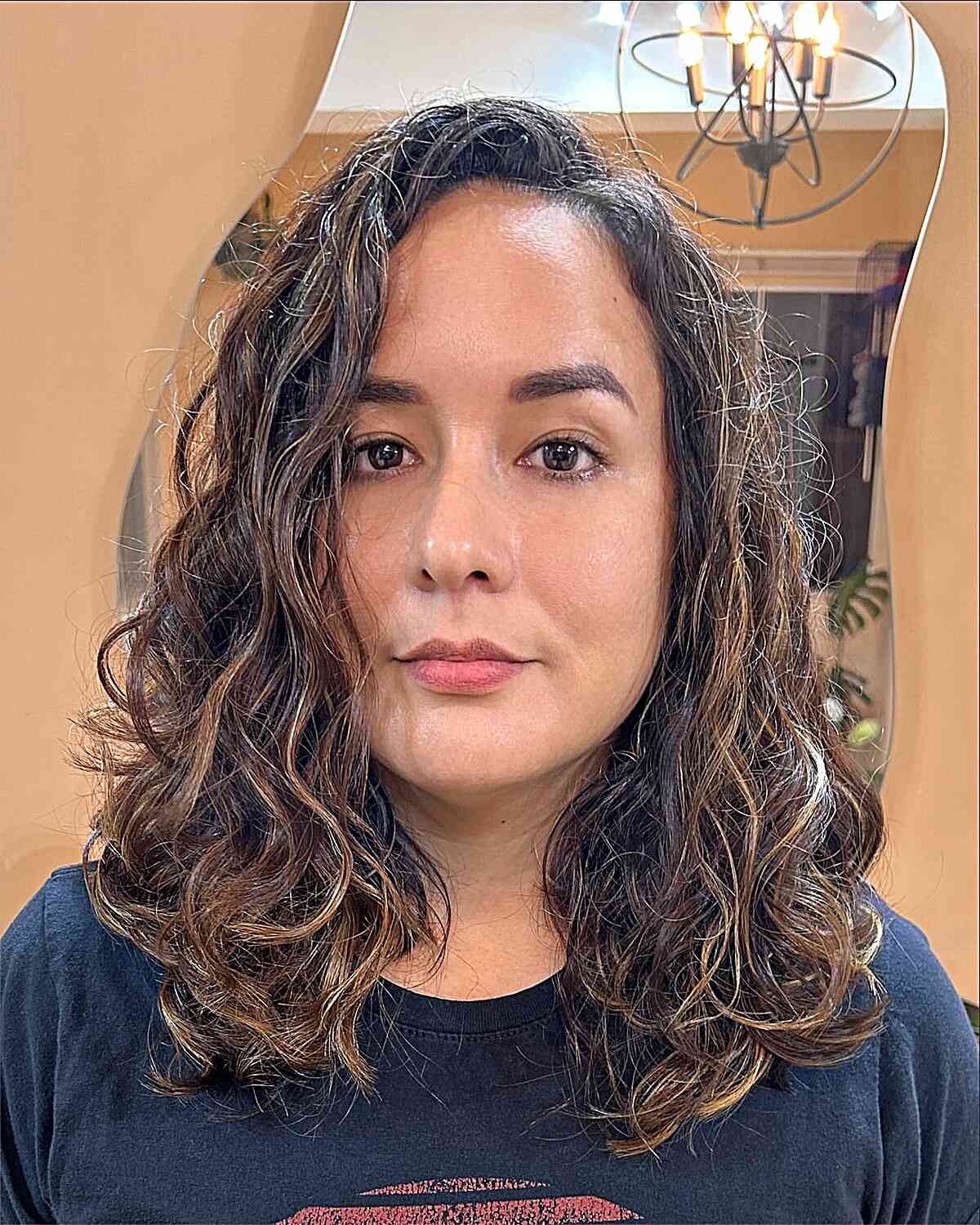 Textured Long Curly Bob with Subtle Highlights
