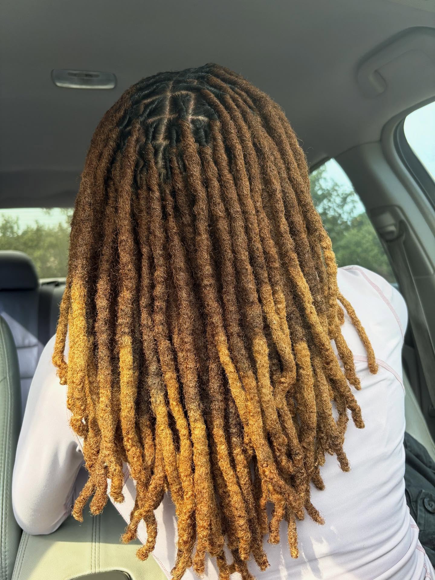 Beautifully Textured Shoulder-Length Locs with a Subtle Ombre Effect