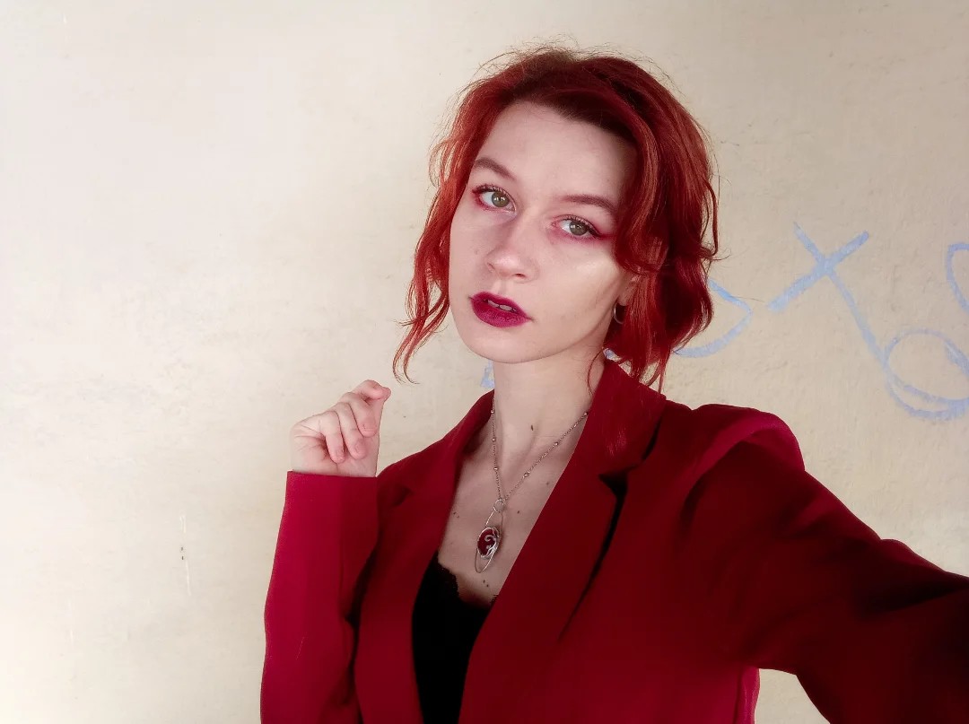 Bold Scarlet Tousled Bob with Side Sweep