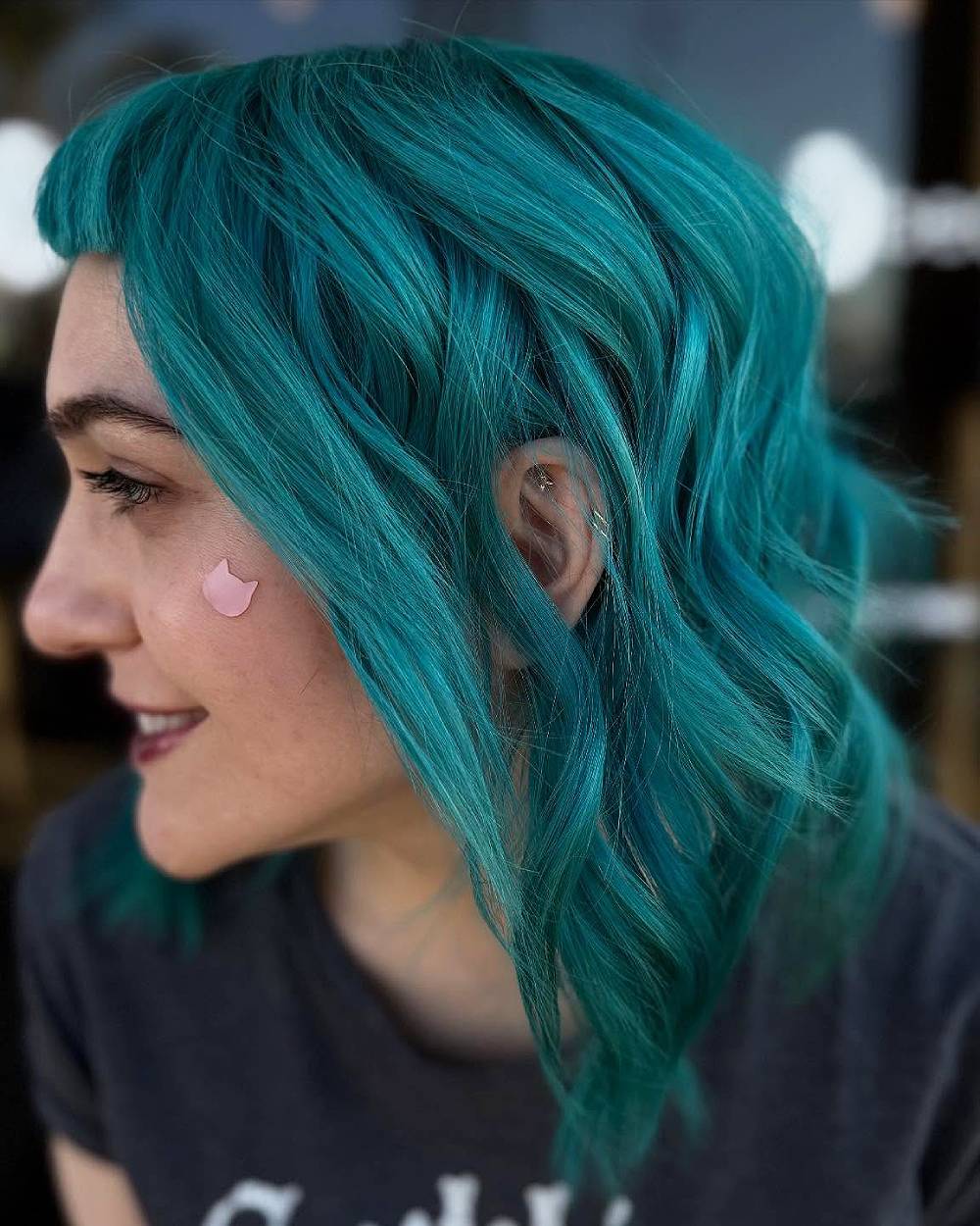Bold Textured Waves with Vibrant Teal Color