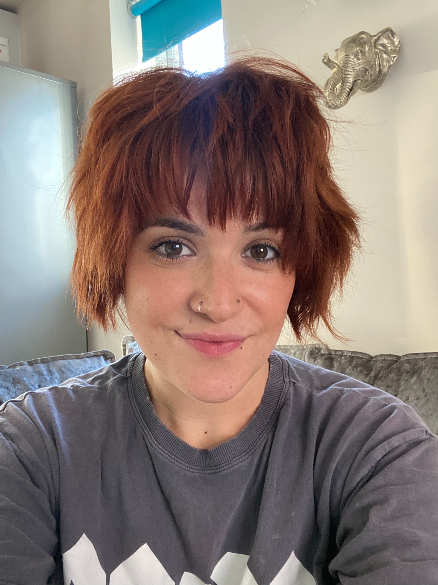 Bright Copper Razored Pixie with Jagged Bangs