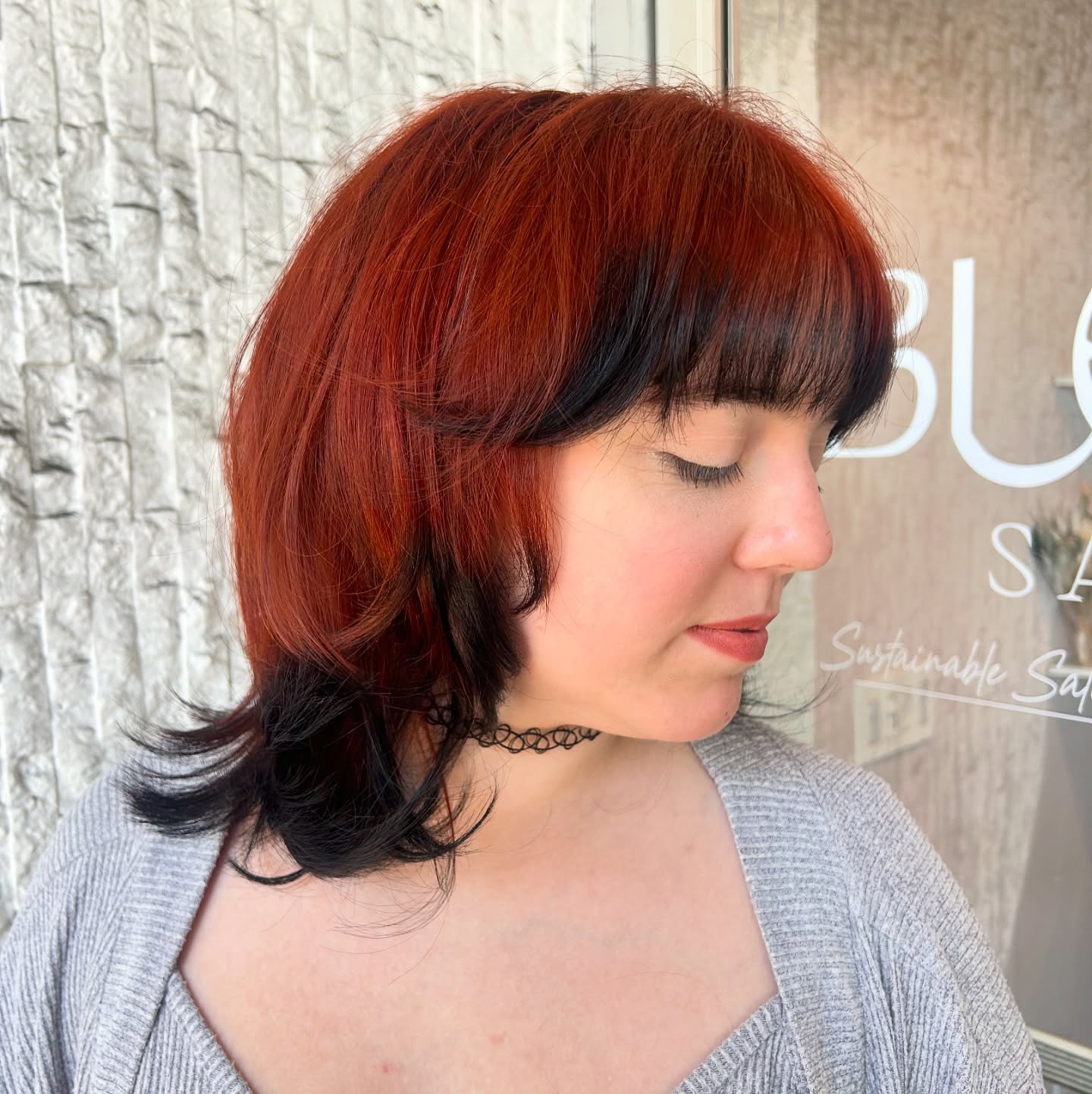 Chic Brunette Bob with Autumn Red Highlights