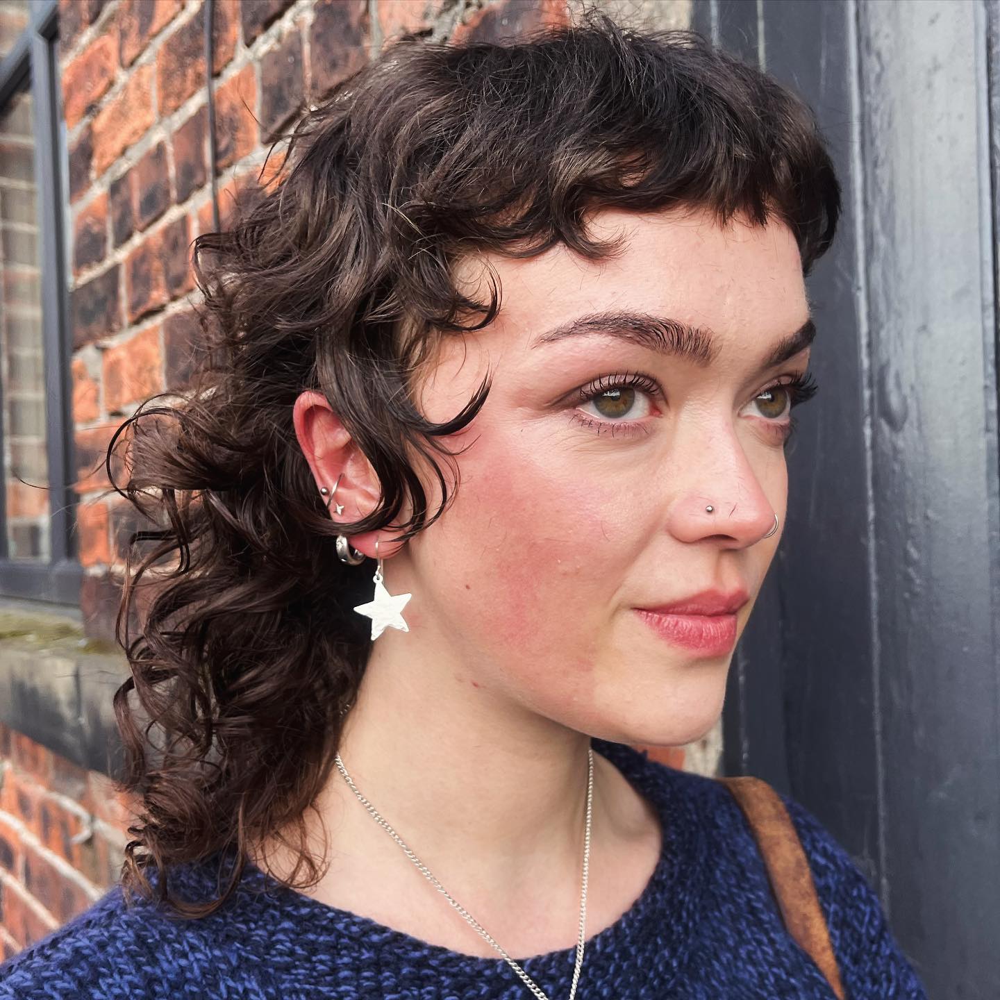 Choppy Curly Mullet with Playful Bangs