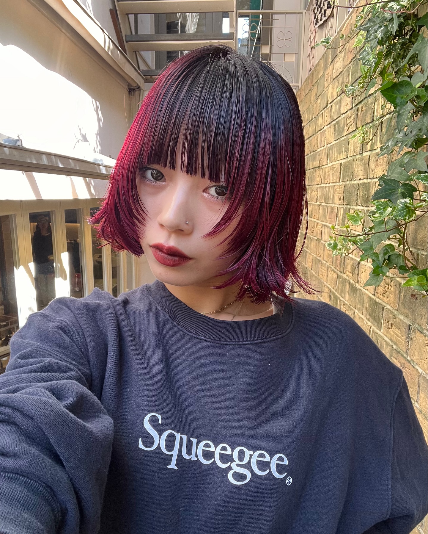 Daring Wine-Red Chop with Feathered Fringe