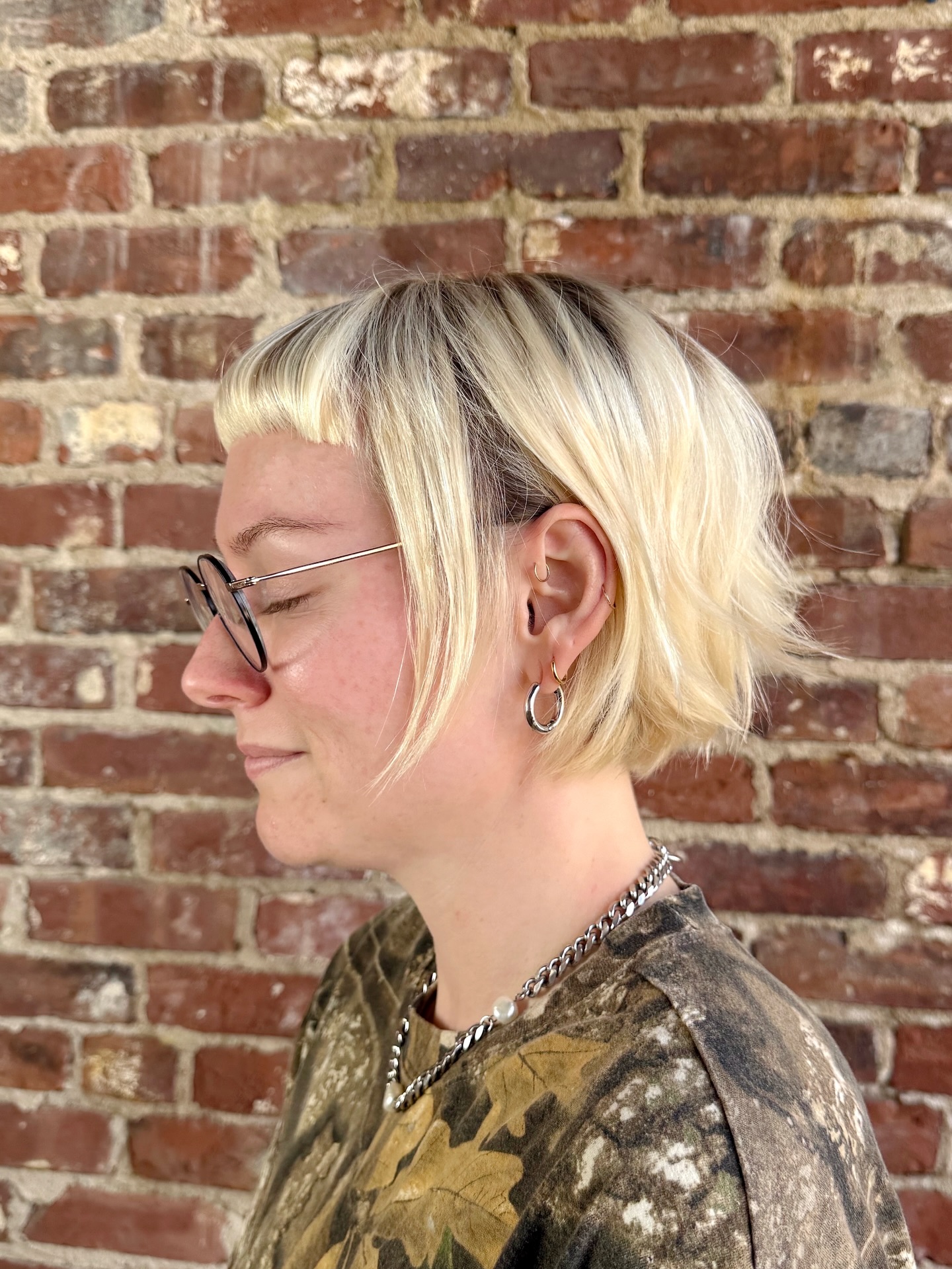 Platinum Blonde Chop with Contrasting Black Undercut