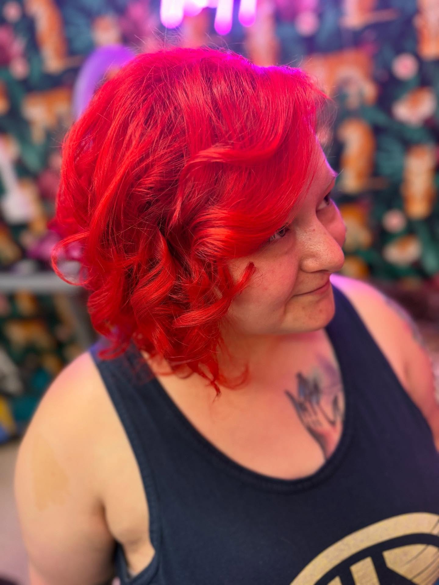 Rich Crimson Waves with Soft Side-Swept Bangs