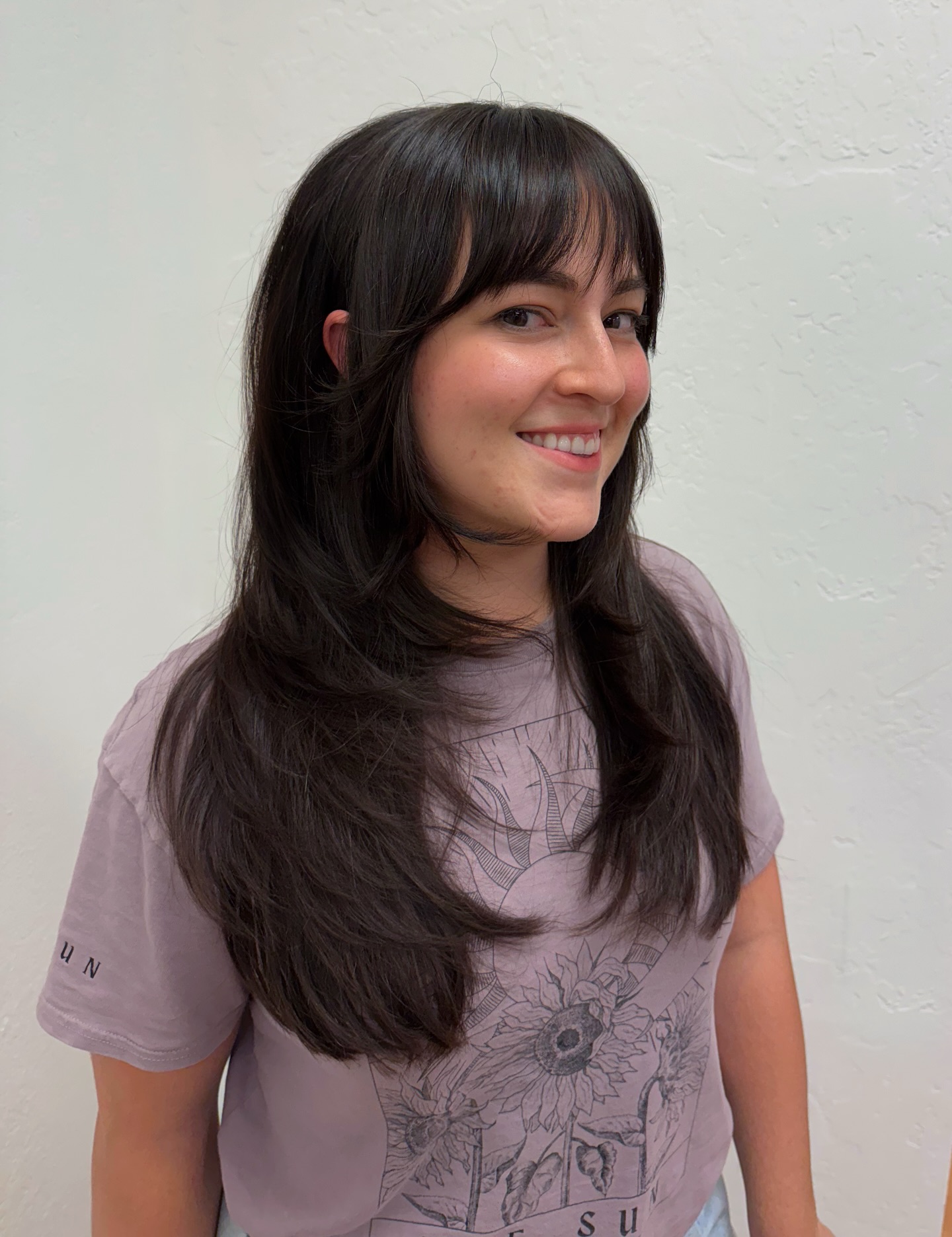 Soft Ebony Layers with Side-Swept Bangs