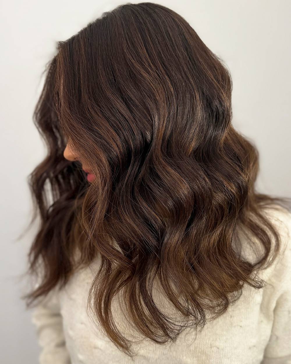 Softly Textured Dark Brunette Balayage with Subtle Highlights