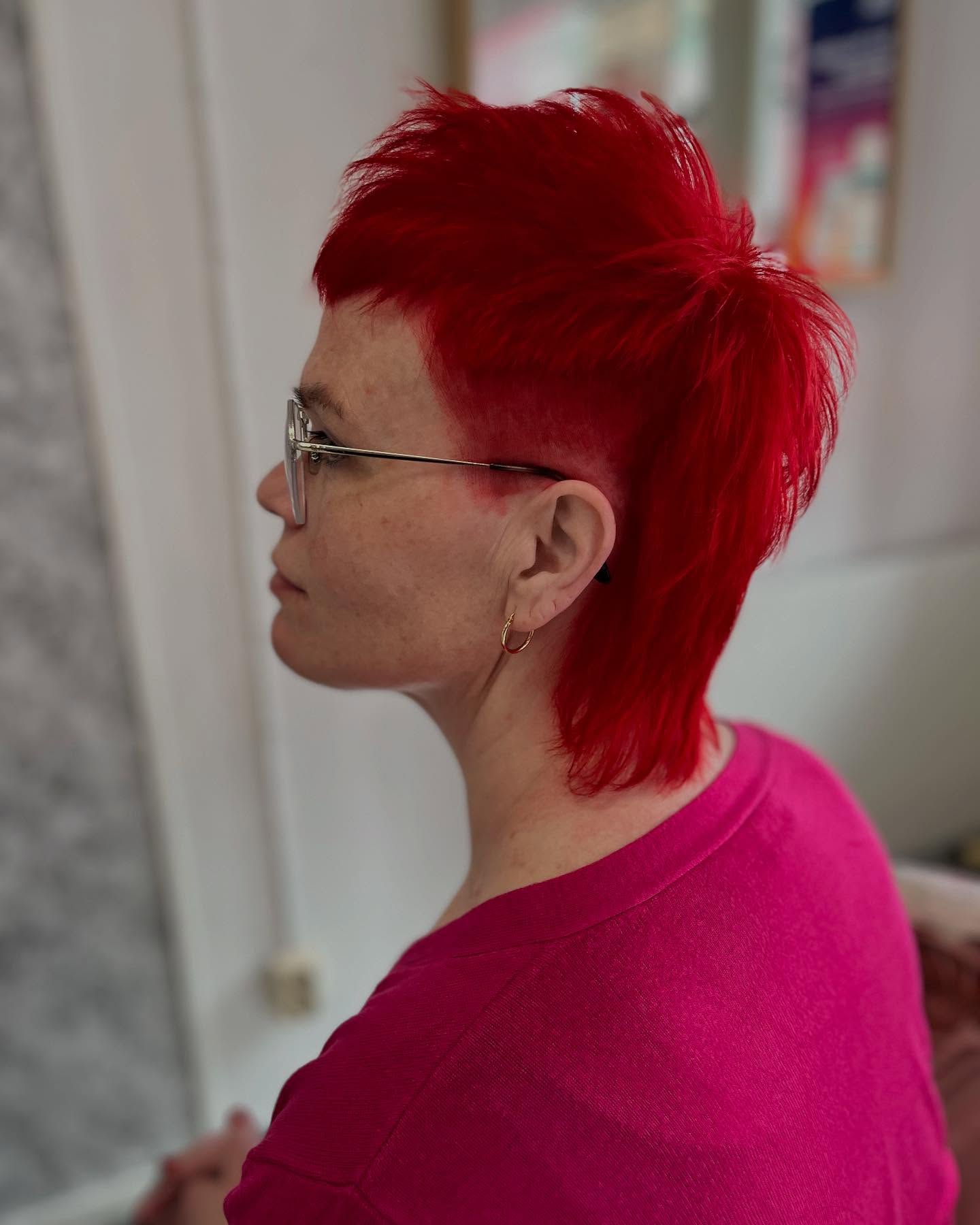 Striking Red Wedge Cut with Angular Detailing