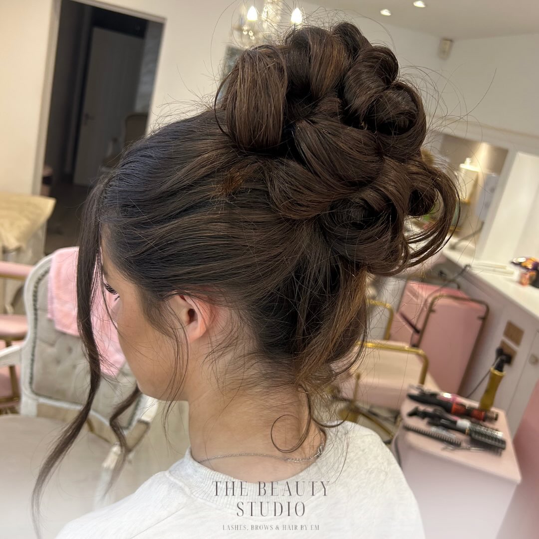 Sumptuous Brunette Textured Loop Updo