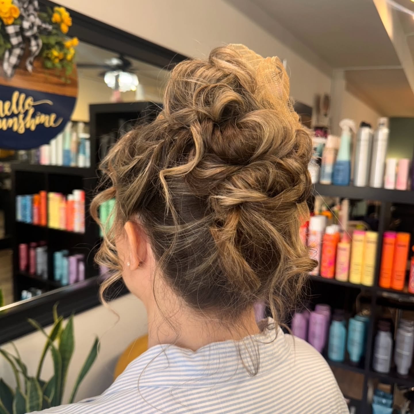 Twirled Tussled Updo with Hidden Braid Accents