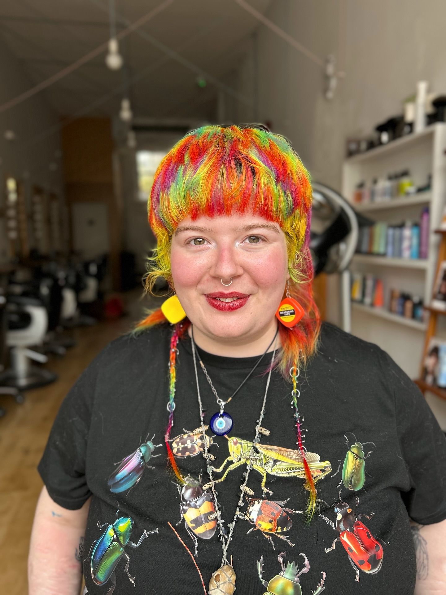 Vibrant Rainbow Bowl Cut with Playful Side Accents