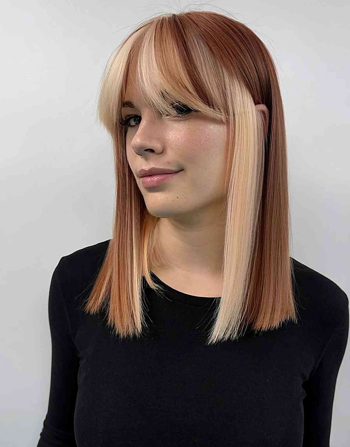 Bold Two-Tone Straight Haircut with Fringe