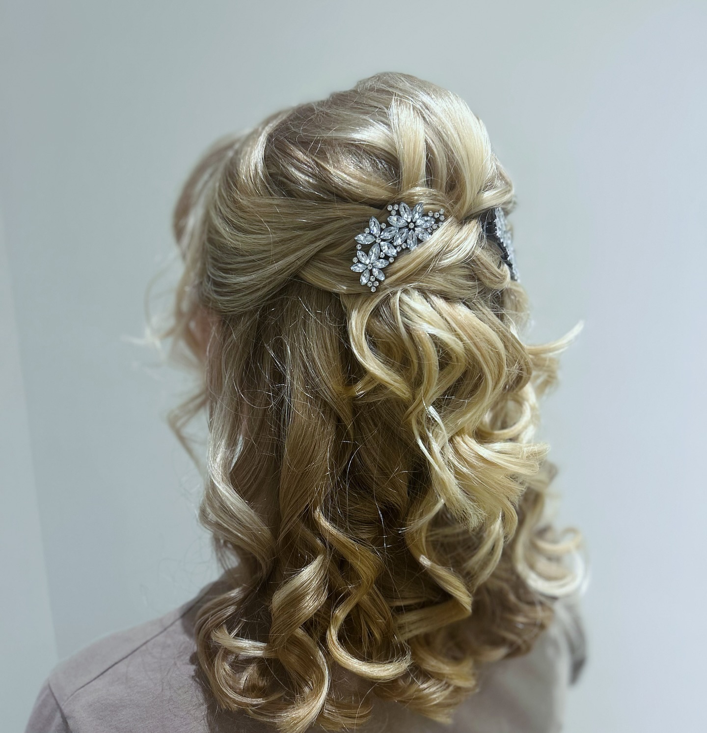 Chic Half-Up Curled Style with Sparkling Accents