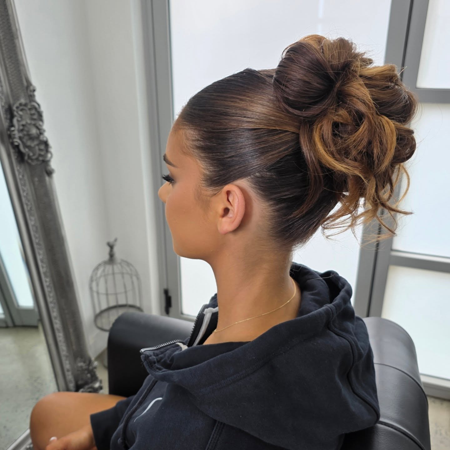 Chic High Bun with Textured Curls