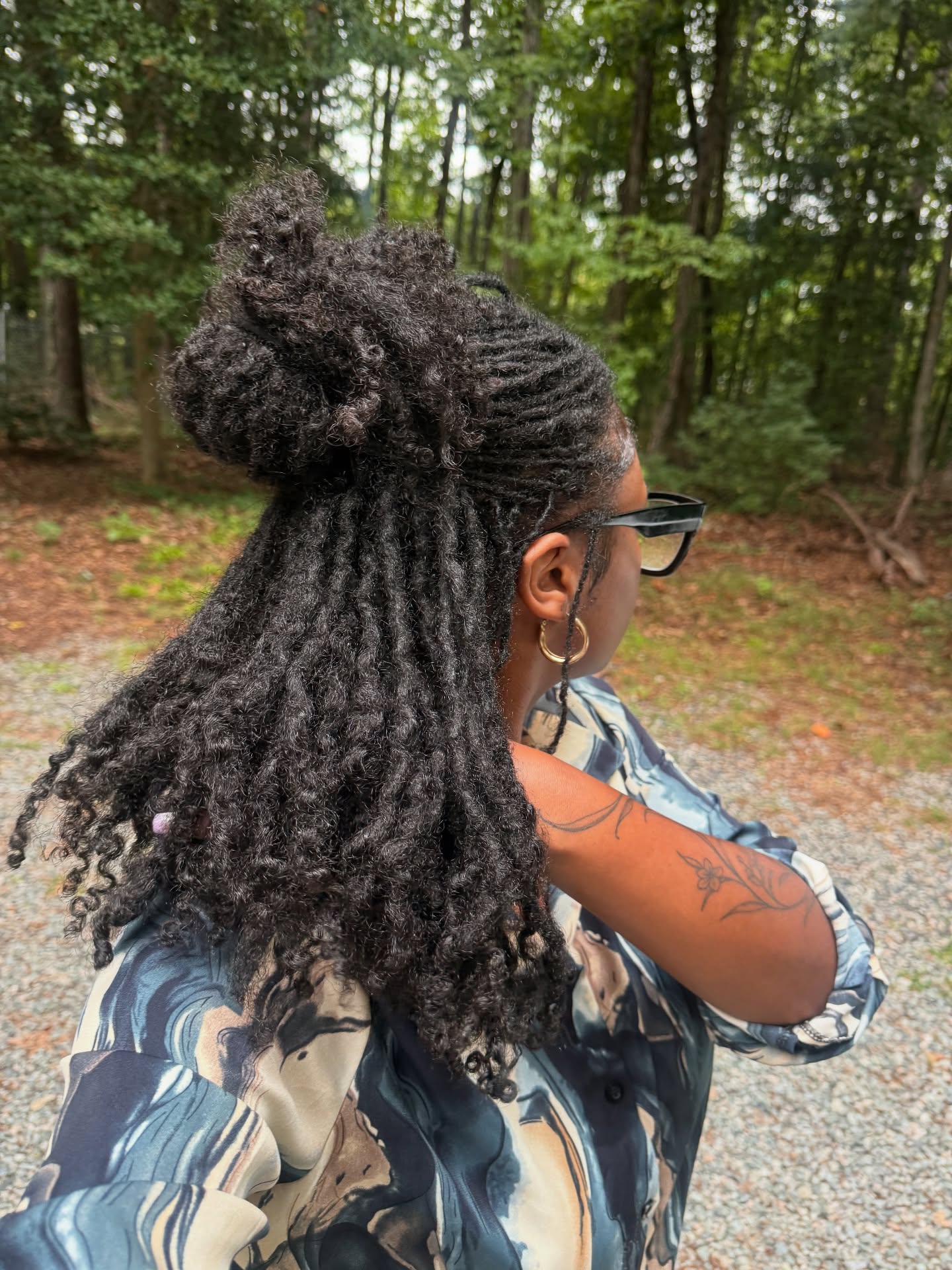 Chic Twisted Locs with Playful High Bun