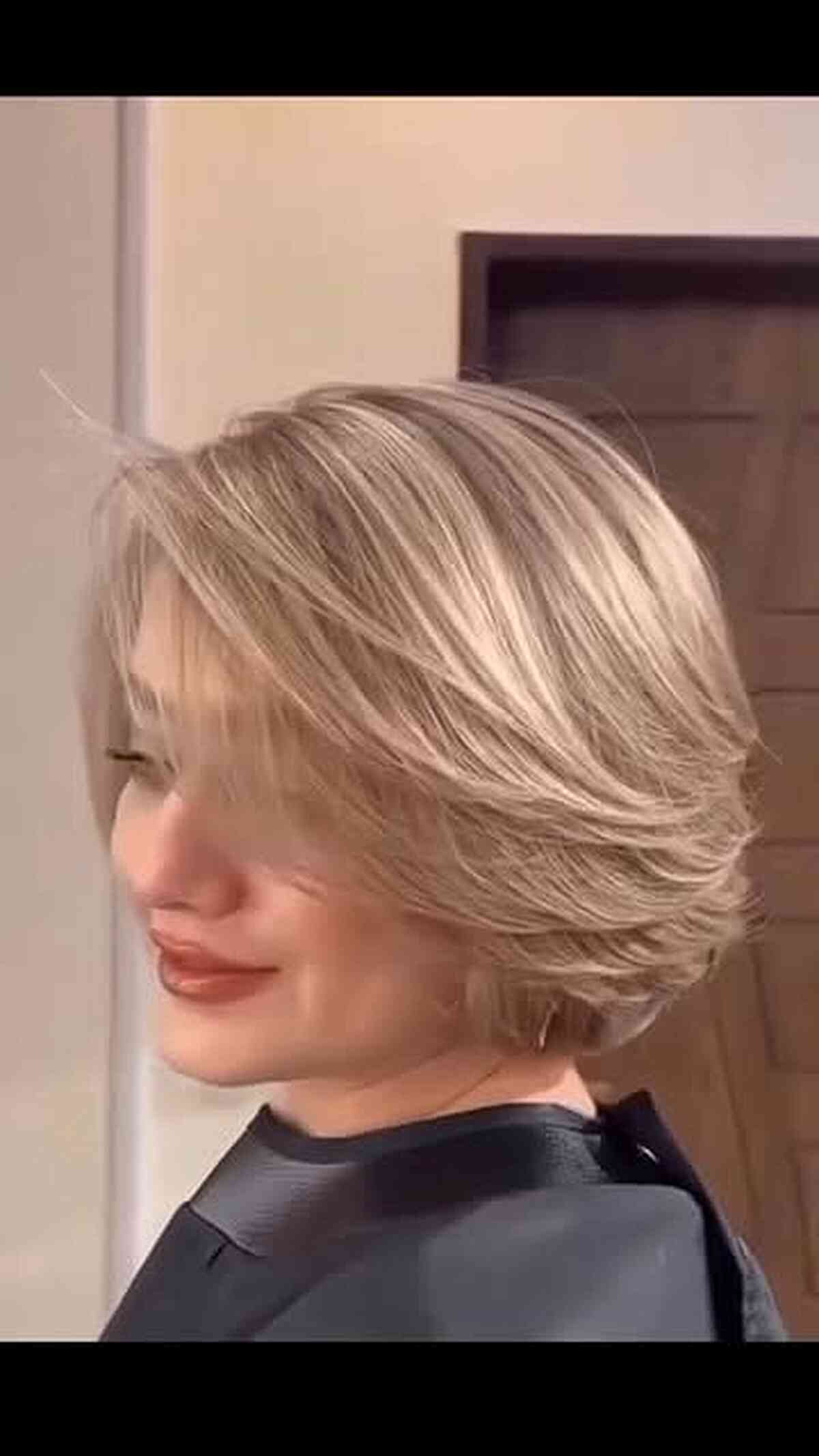 Chin-Length Layered Bob with Feathered Ends