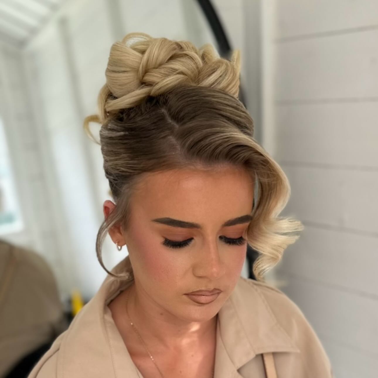 Elegant Twisted Crown with Soft Blonde Highlights
