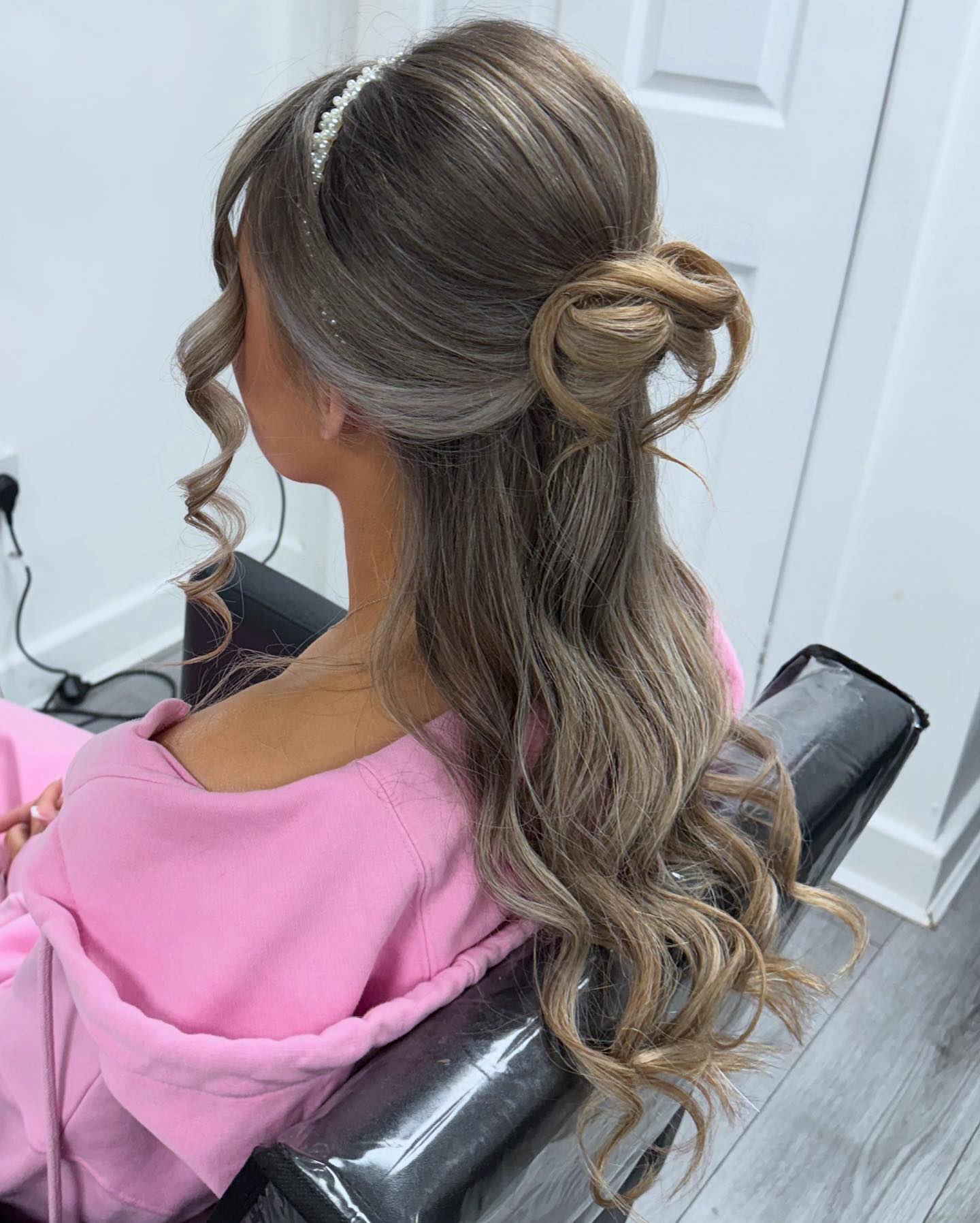 Glamorous Pearl-Embellished Ponytail with Cascading Curls