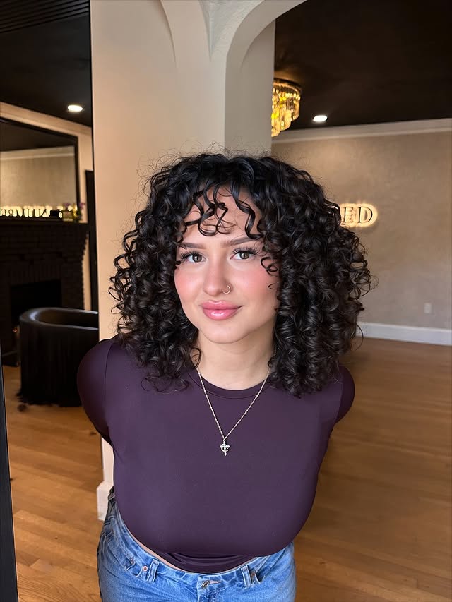 Lush Voluminous Curly Bob with Fringe