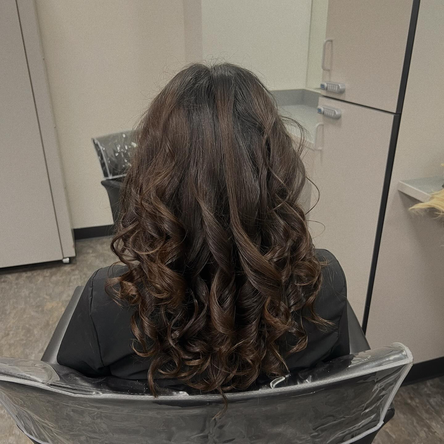 Luxurious Deep Curls with Rich Chocolate Tones