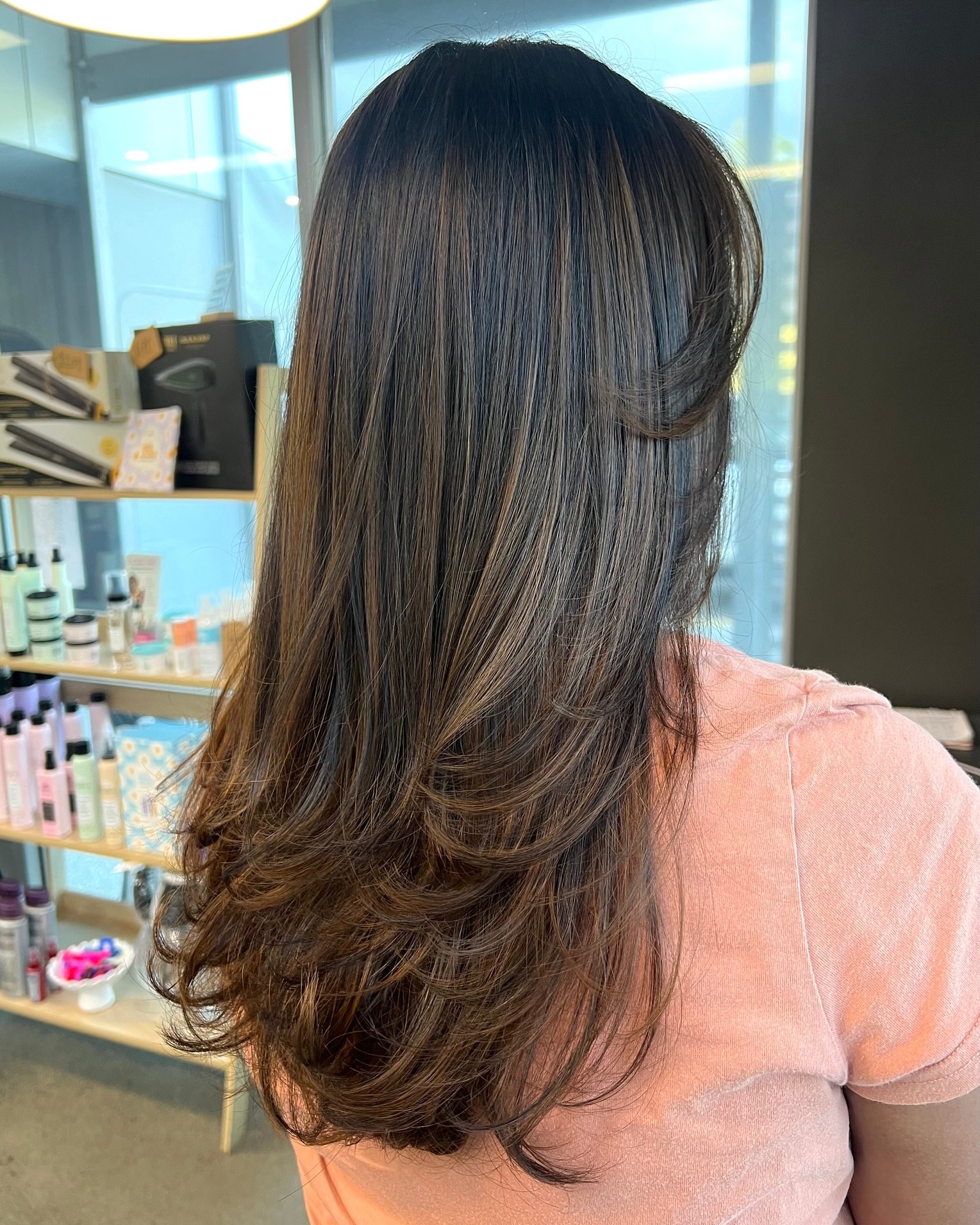 Radiant Caramel Balayage on Long, Smooth Layers