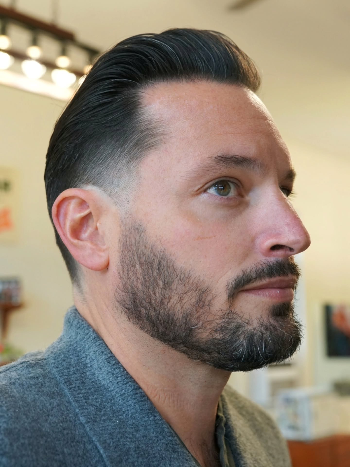 Sleek Tapered Pompadour with Clean Side Part