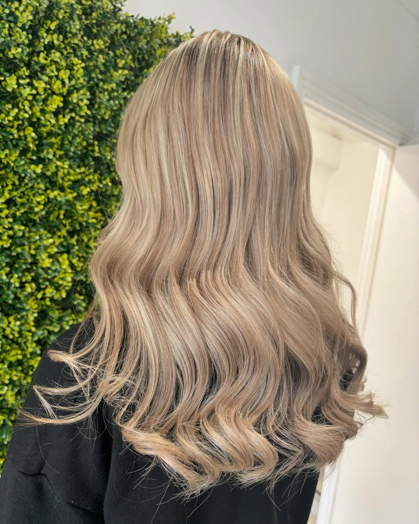 Soft Sun-Kissed Blonde Waves with Rich Lowlights