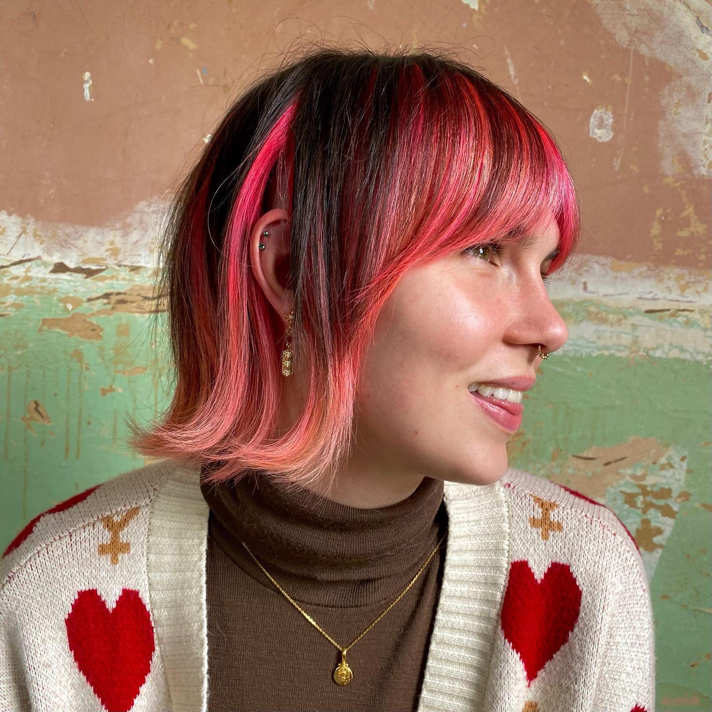 Bold Playful Pink and Black Bob with Soft Bangs