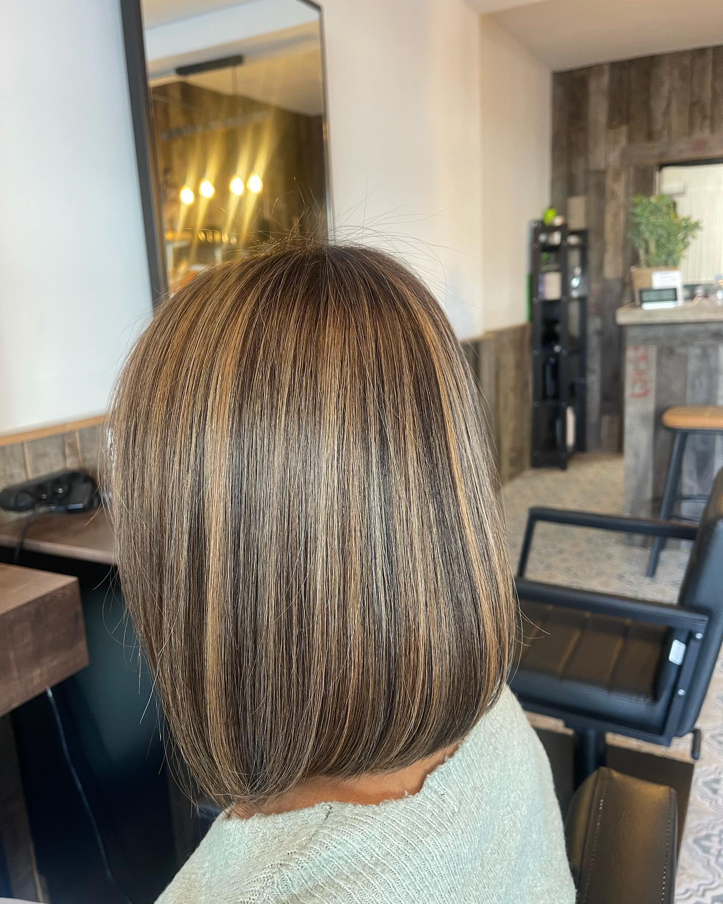 Chic Blunt Bob with Sun-Kissed Balayage Highlights