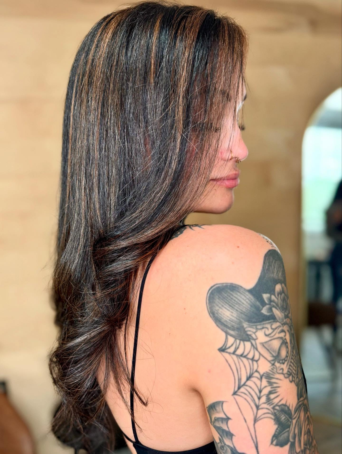 Chic Long Brunette Layers with Bold Highlights