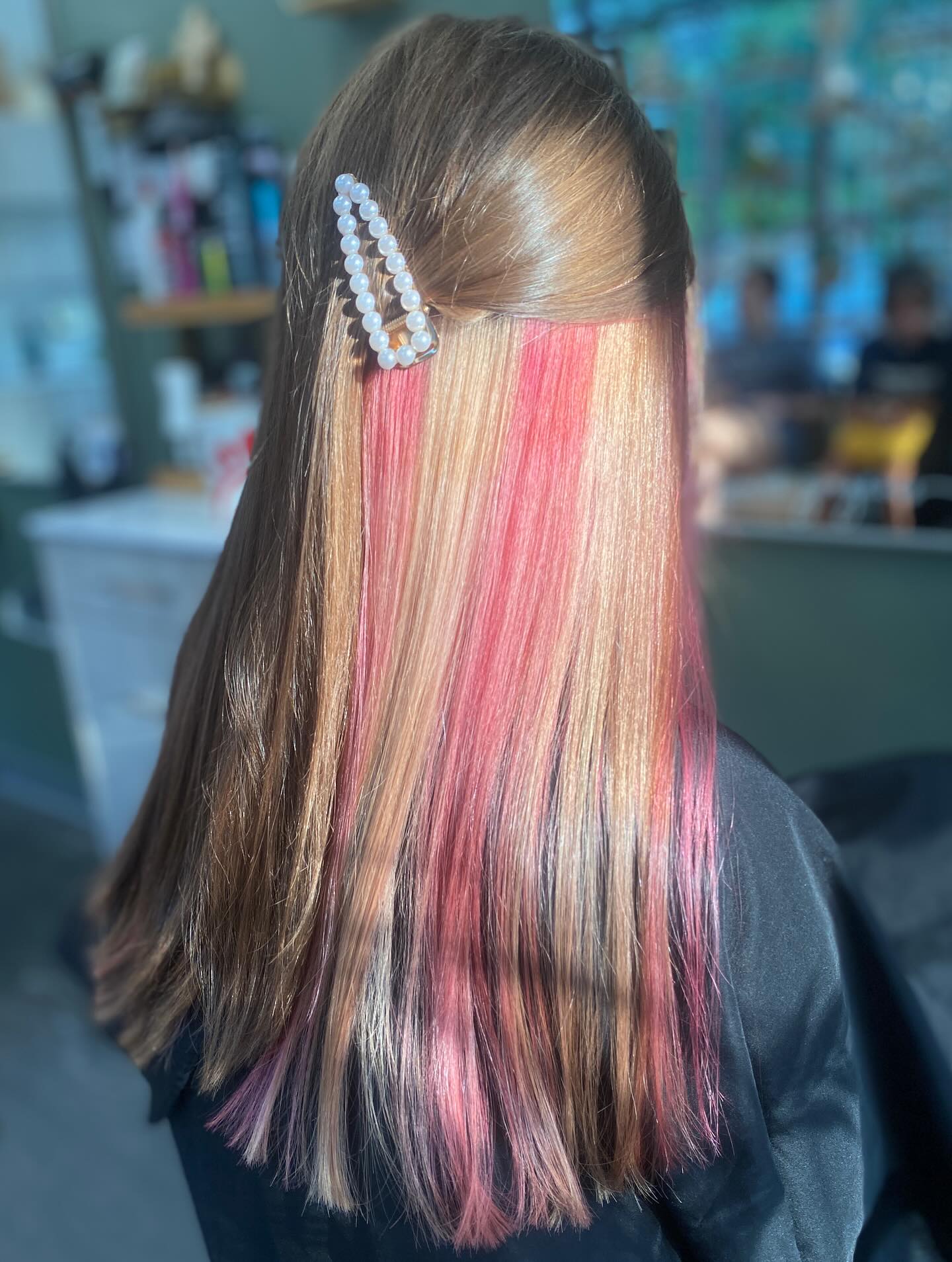 Chic Long Hair with Bold Pink Highlights