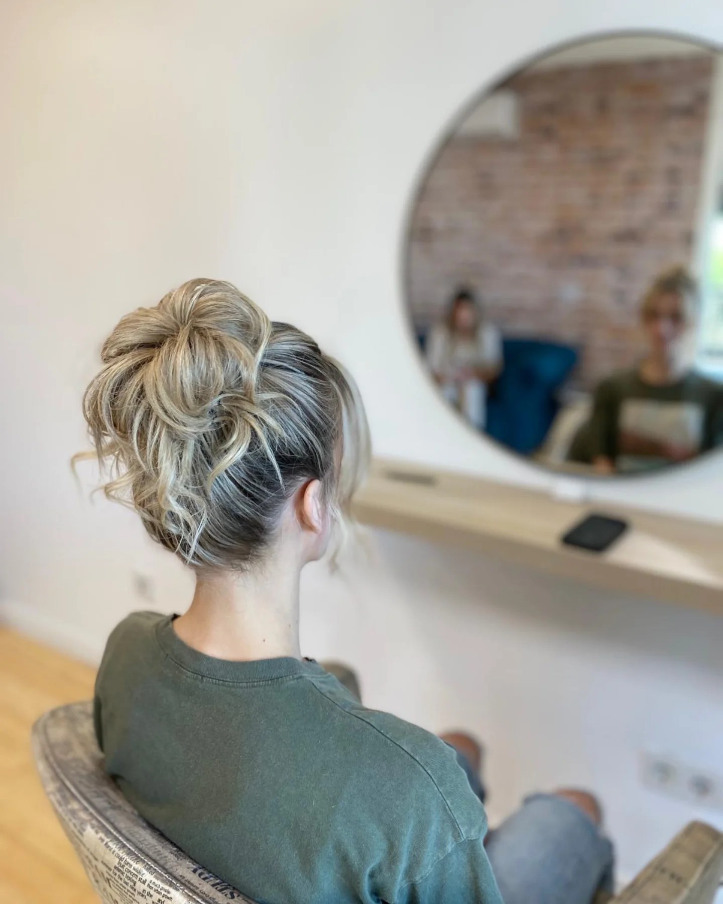 Creative Twisted Blonde Updo with Loose Strands