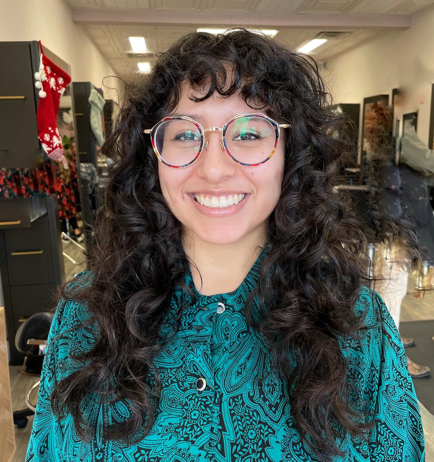 Dynamic Curly Wolfcut with Playful Bangs