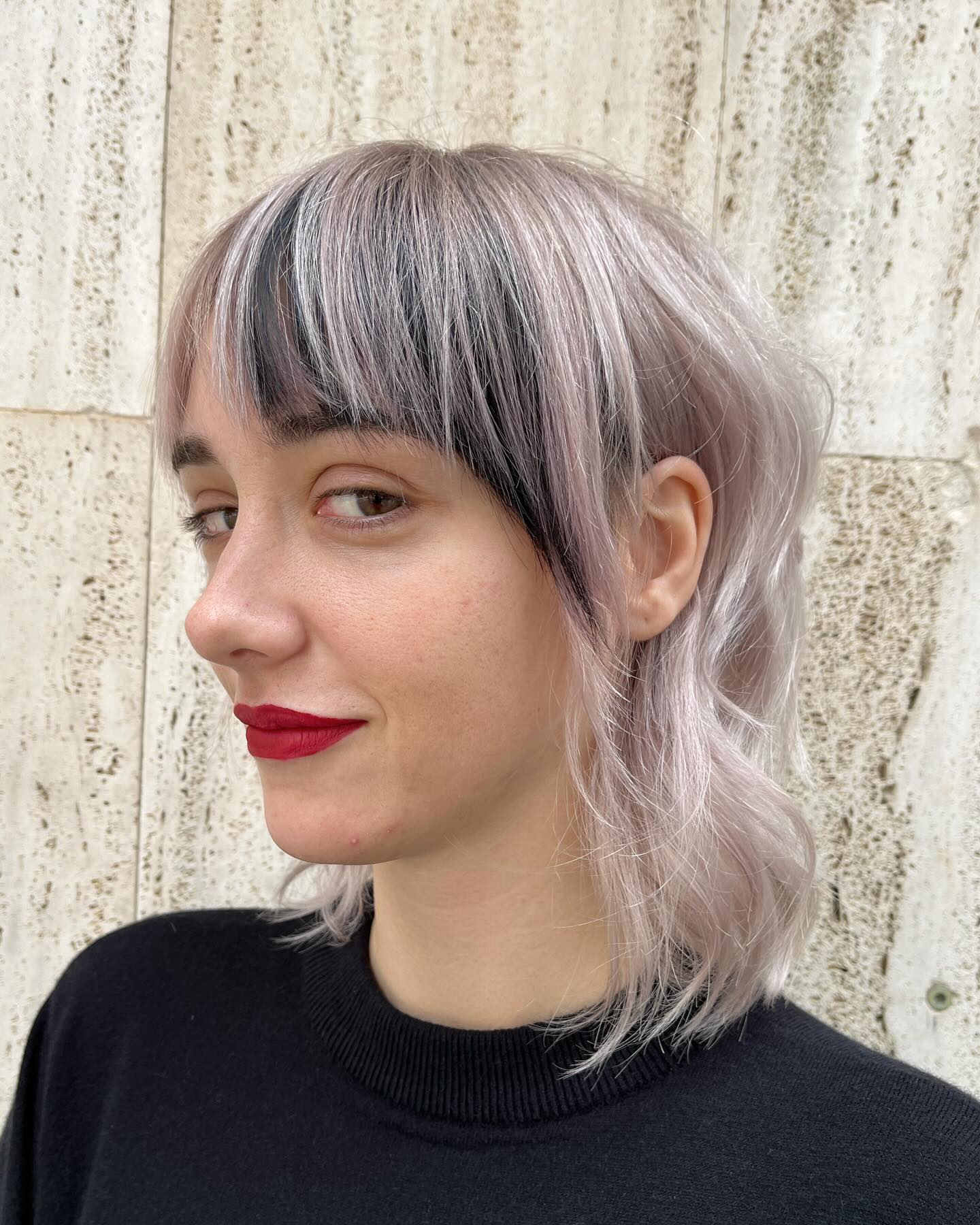 Edgy Layered Bob with Bold Dark Roots