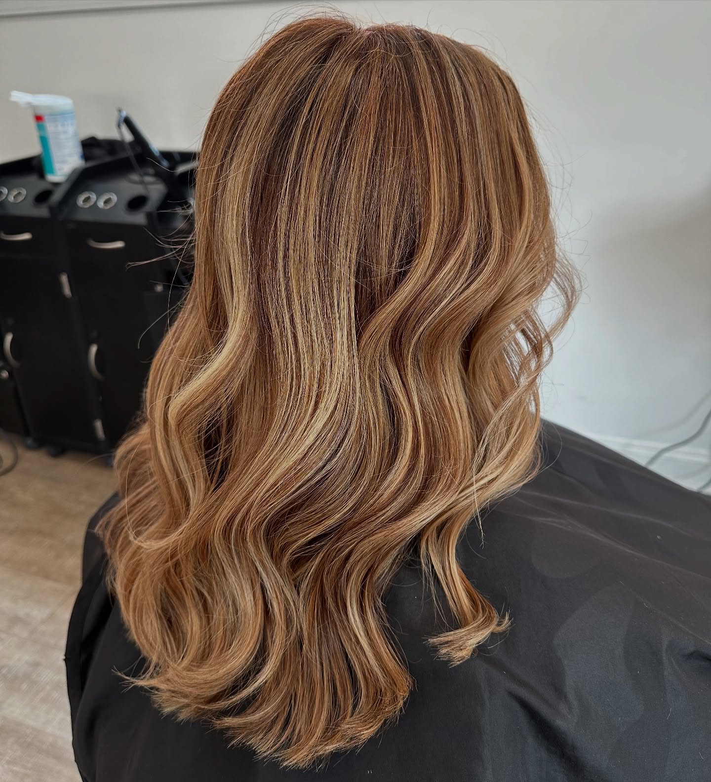 Elegant Brunette Waves with Subtle Caramel Highlights