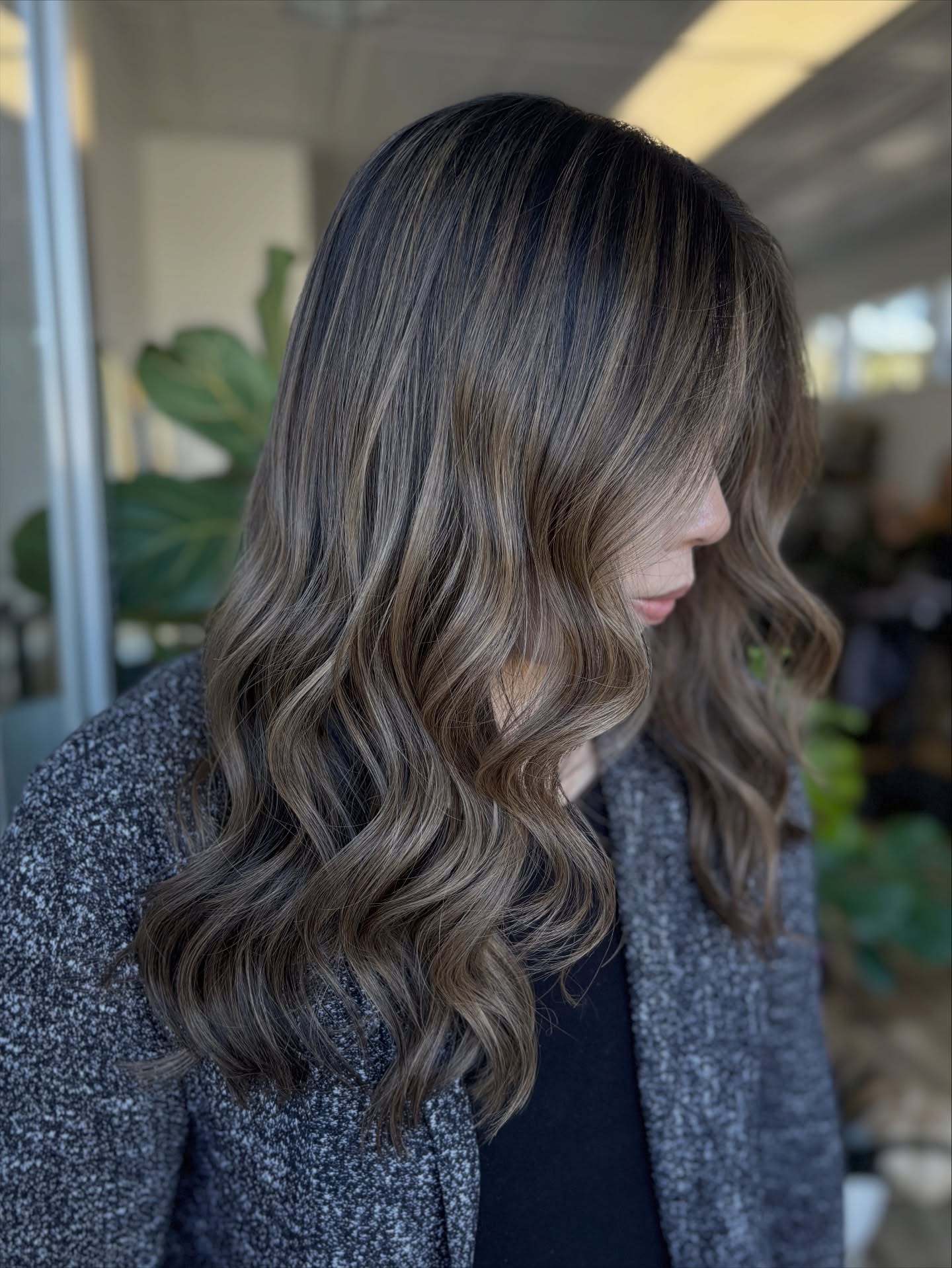Elegant Brunette Waves with Subtle Dimensional Highlights