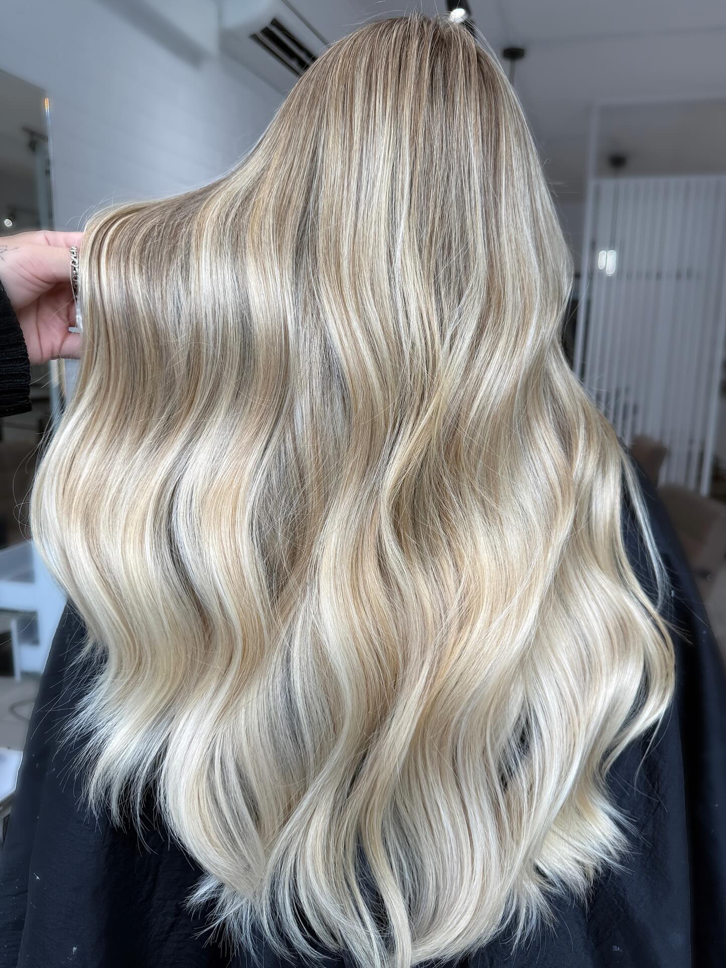 Flowing Ice-Blonde Layers with Subtle Balayage